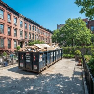 Residential dumpster rental in Brooklyn filled with construction debris in a sunny neighborhood